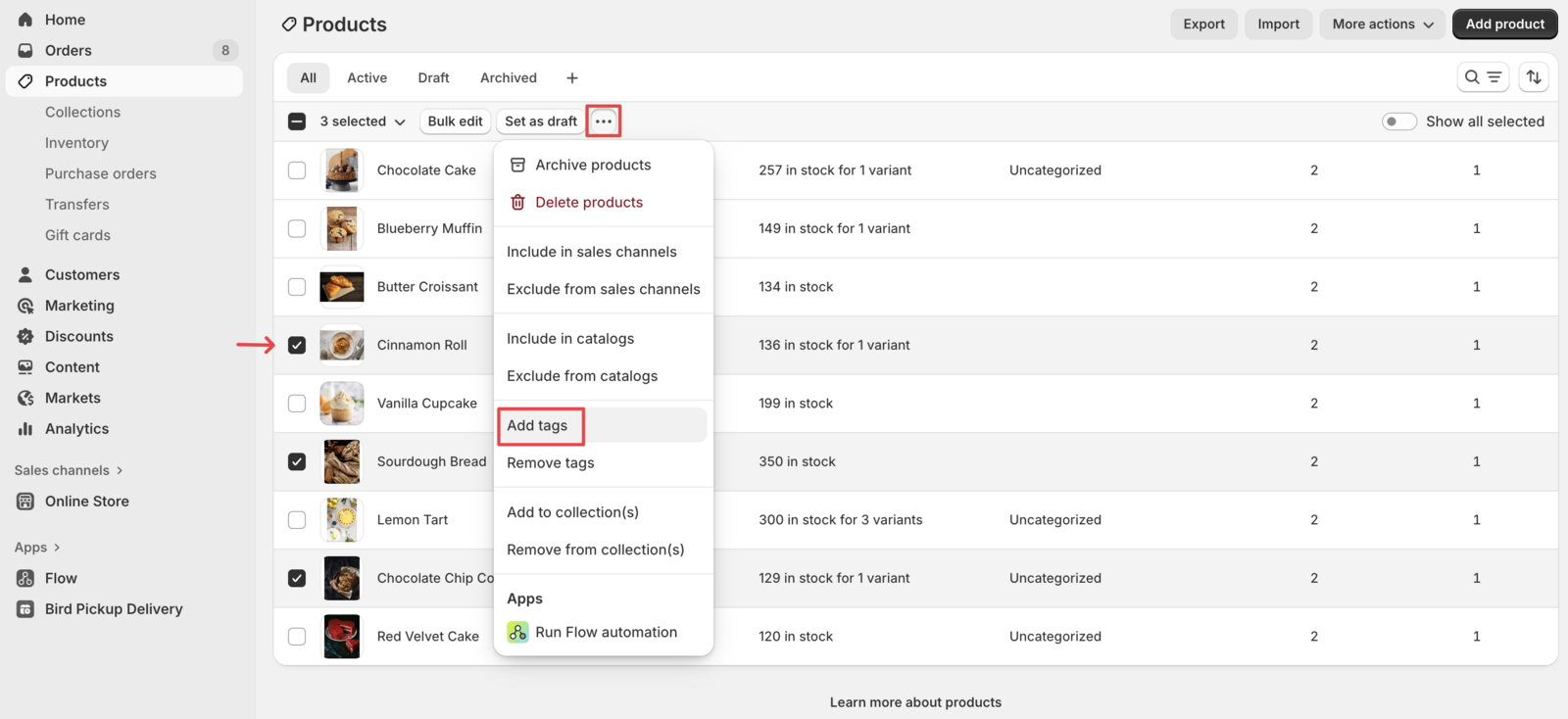 Shows the product selection interface with the three-dot menu button highlighted for bulk actions